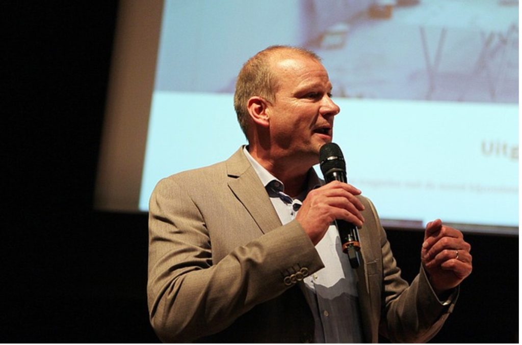 A speaker talking at an event.